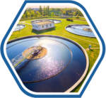 An aerial view of a water treatment facility with large circular tanks, highlighting the importance of clean and purified water in the manufacturing process of Raw Material Supplies.